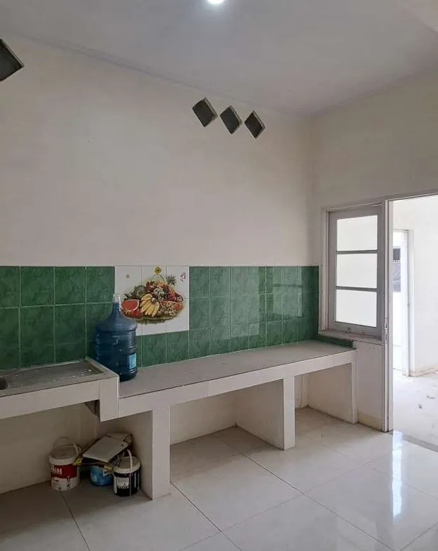 Jual cepat rumah di Taman Raffles Jatimulya sebelah taman lingkungan