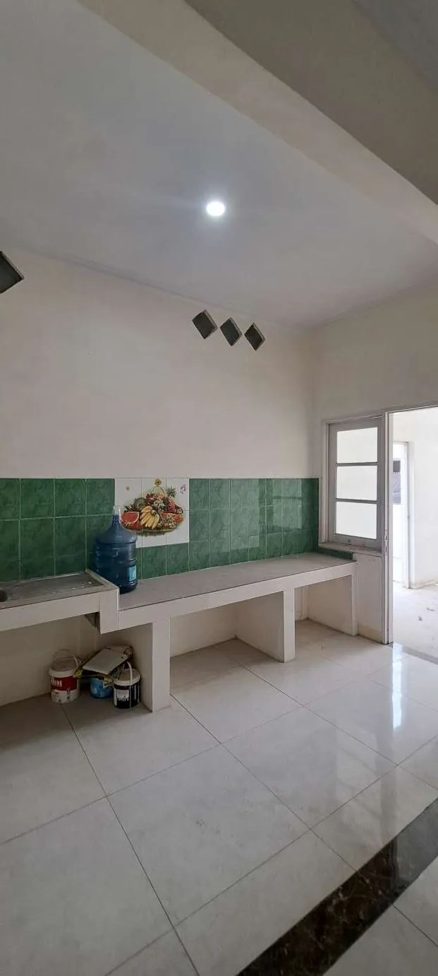 Jual cepat rumah di Taman Raffles Jatimulya sebelah taman lingkungan